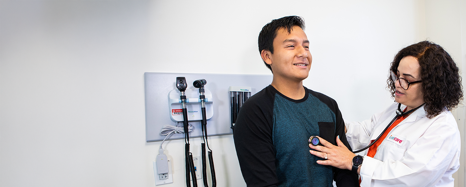 TrueCare family medicine doctor with a patient