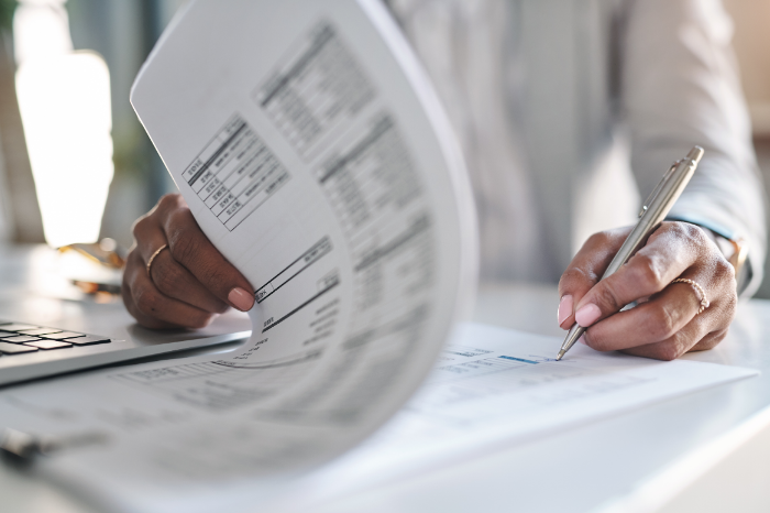 does truecare offer employees 401k plan A picture of someone who is going through paperwork, which is what many people envision when asking, Does TrueCare offer employees a 401(K) plan?